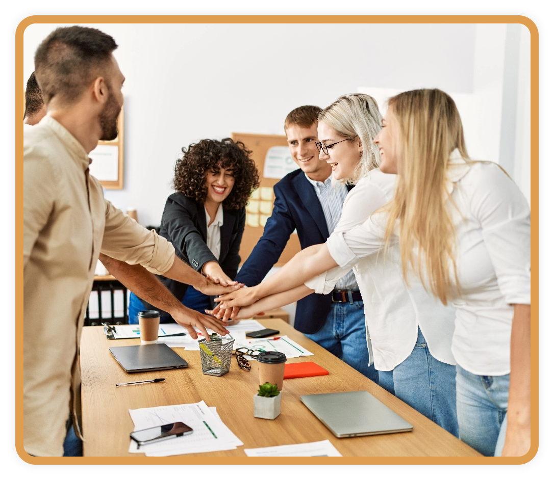 A health insurance broker group working together in a conference room