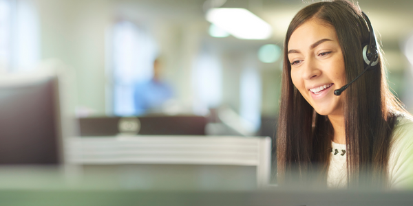 Work-Life Counselor in the Carebridge EAP call center ready to take your call