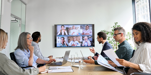 A meeting that is accessible to all employees whether they're in the office, hybrid, or remote.