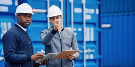 Two engineers discussing a work project.