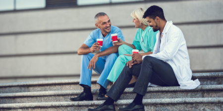 Colleagues enjoying a coffee break from a stressful workday