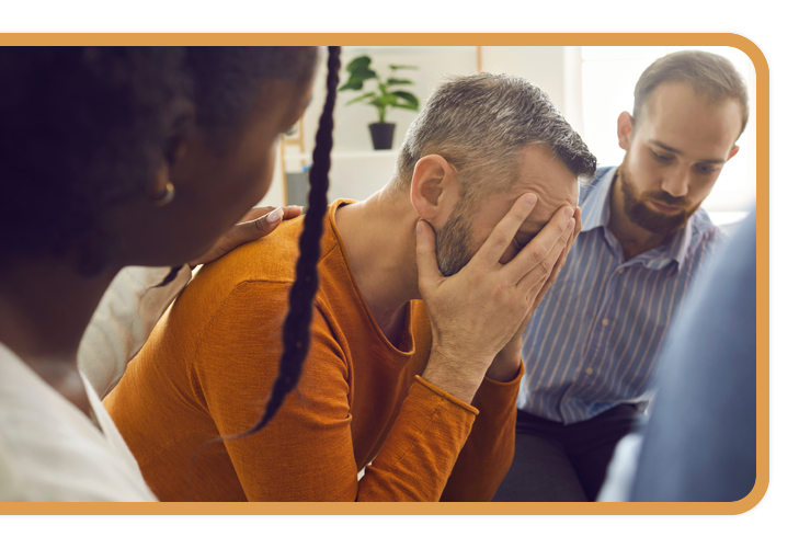 upset workers comforting